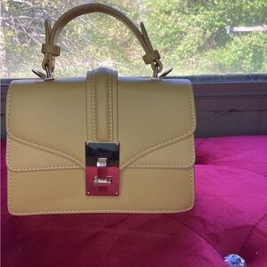 Yellow Mini Bag with Gold Clasp and Structured Design